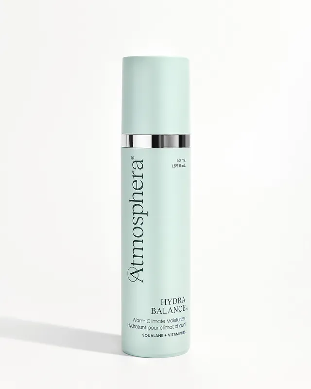 HYDRA BALANCE™ Warm Climate Moisturizer, a 50 mL bottle, on a white studio backdrop.